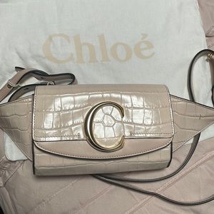 Embossed belt bag
